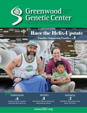 Newsletter cover with family at Race the Helix