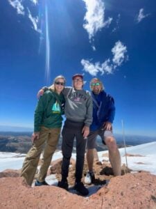 Teenage boy and parents on a mountain