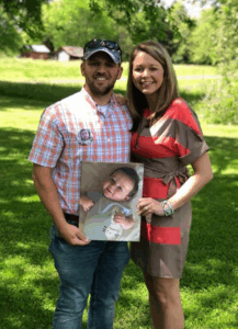 Matt and Melissa Emery holding photo of their late son, Dylan