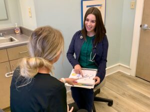 PA explaining genetics to a patient