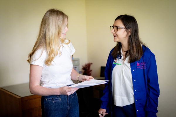 Riley confers with GGC genetic assistant, Maddie Grace Runyans.