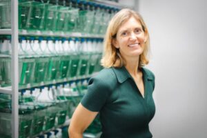 Scientist in aquaculture facility